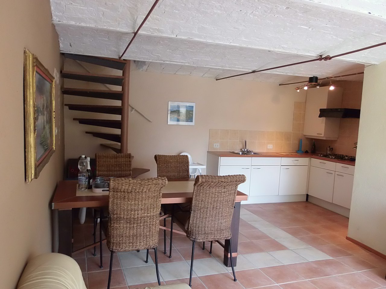 Woonruimte met keukenhoek in Casa Giovanni