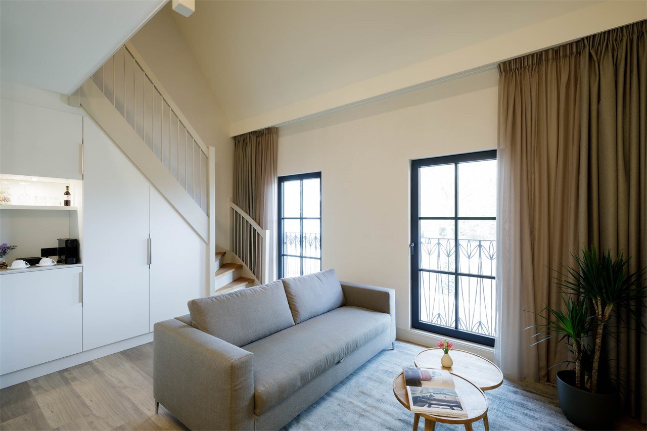 Hotel Flora Batava - Hotelkamer junior suite split level beneden