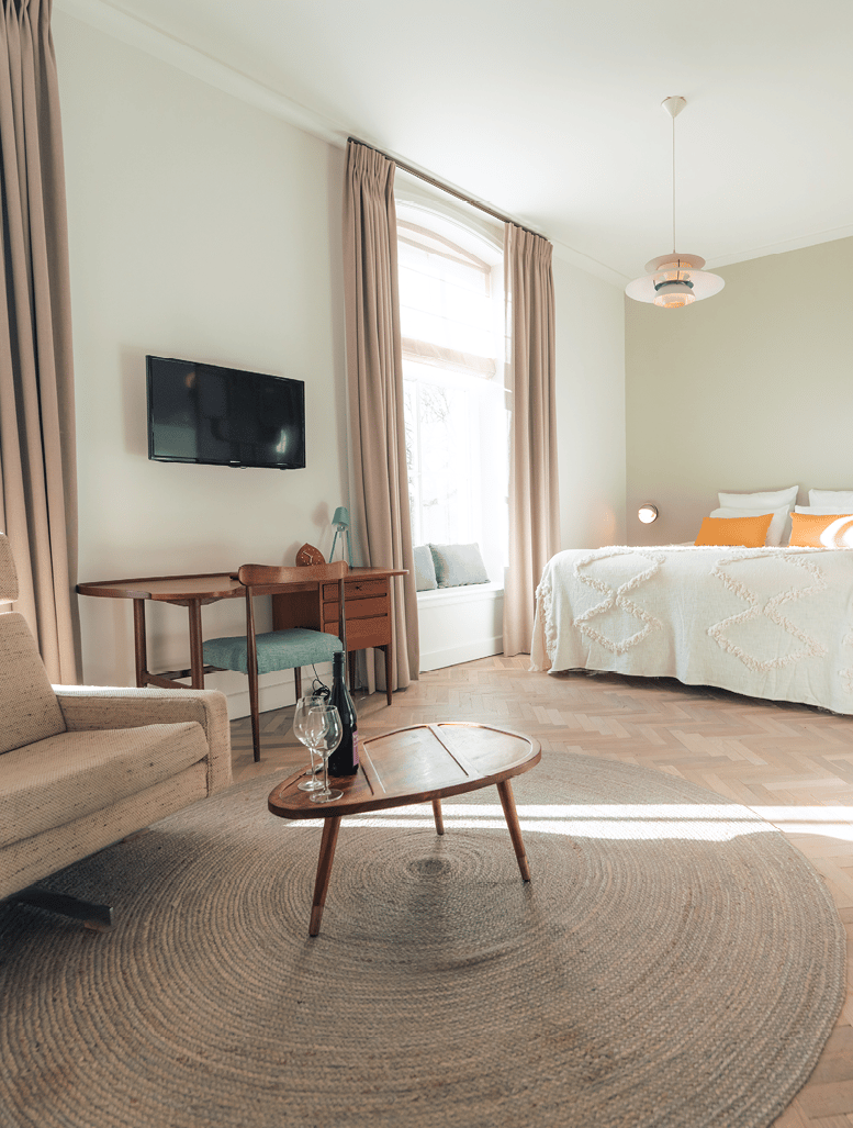 Hotel De Witte Dame suites.png